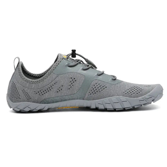 Zapatillas Smart I grises vista lateral interna mostrando tejido respirable.