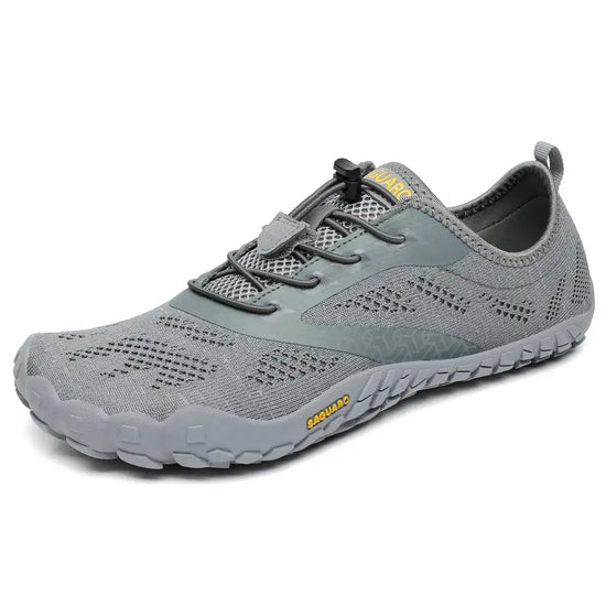 Zapatillas Saguaro Smart I grises vista lateral con diseño barefoot minimalista.