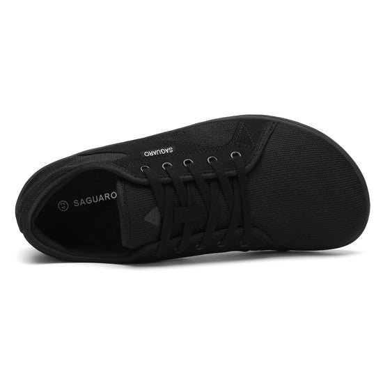 Vista superior calzado minimalista negro, puntera ancha para dedos.